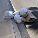 5 full bags of trash and big pieces of cardboard